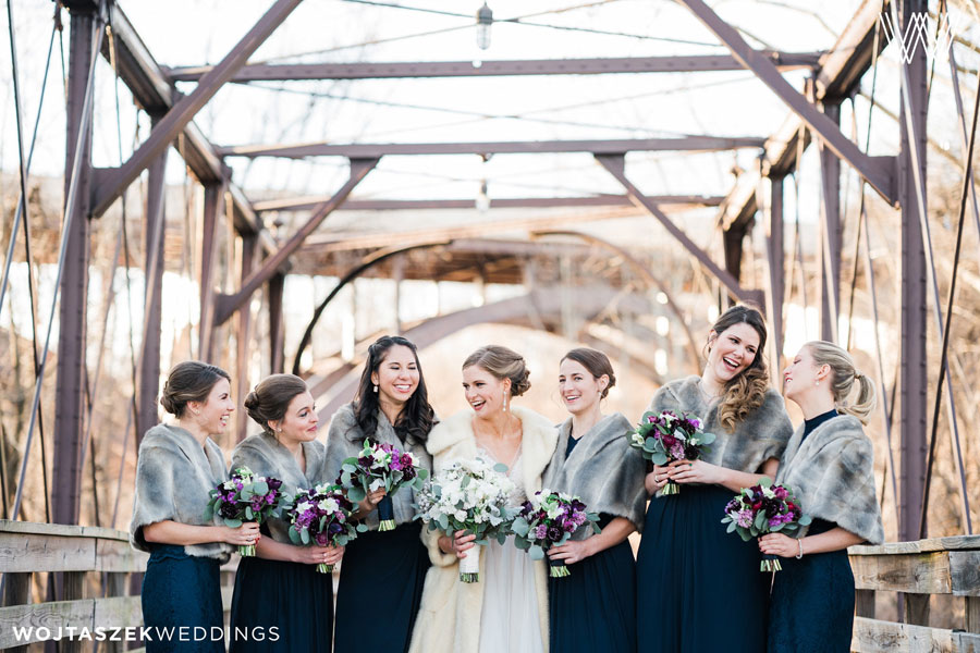 Bride with her Bridesmaids at Winter Wedding with Floral Bouquets
