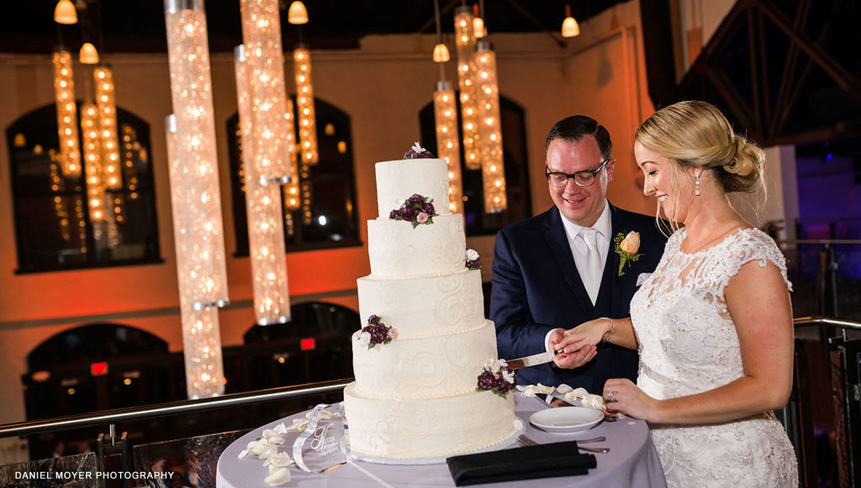 Bride and Groom Cut Cake in Mezzanine