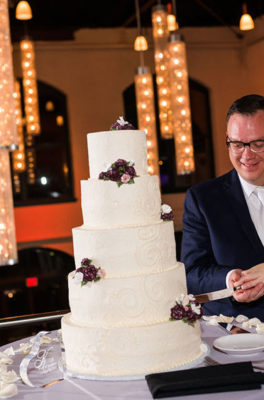 Bride and Groom Cut Cake in Mezzanine